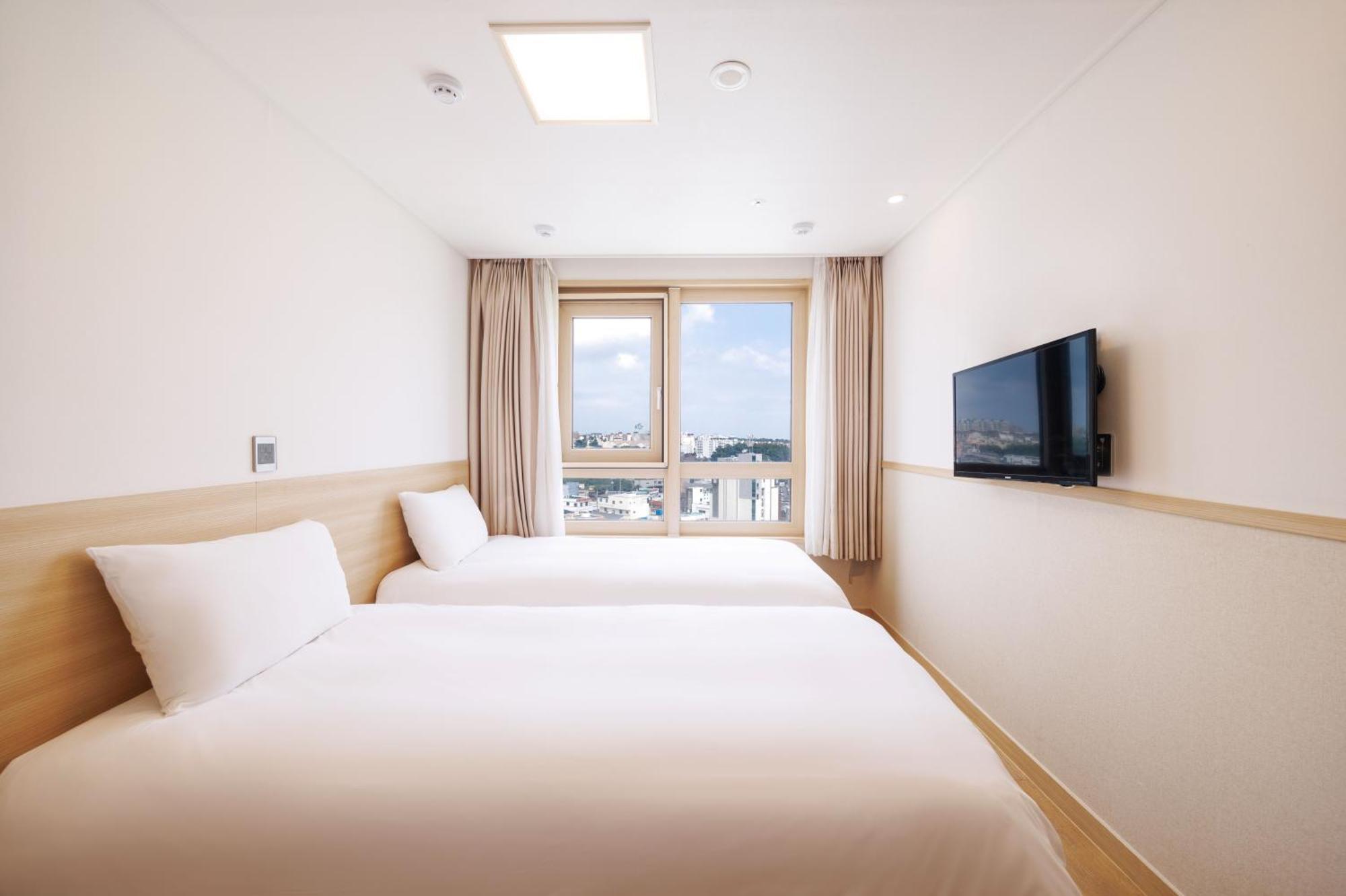 Hotel Kenny Seogwipo Eksteriør billede